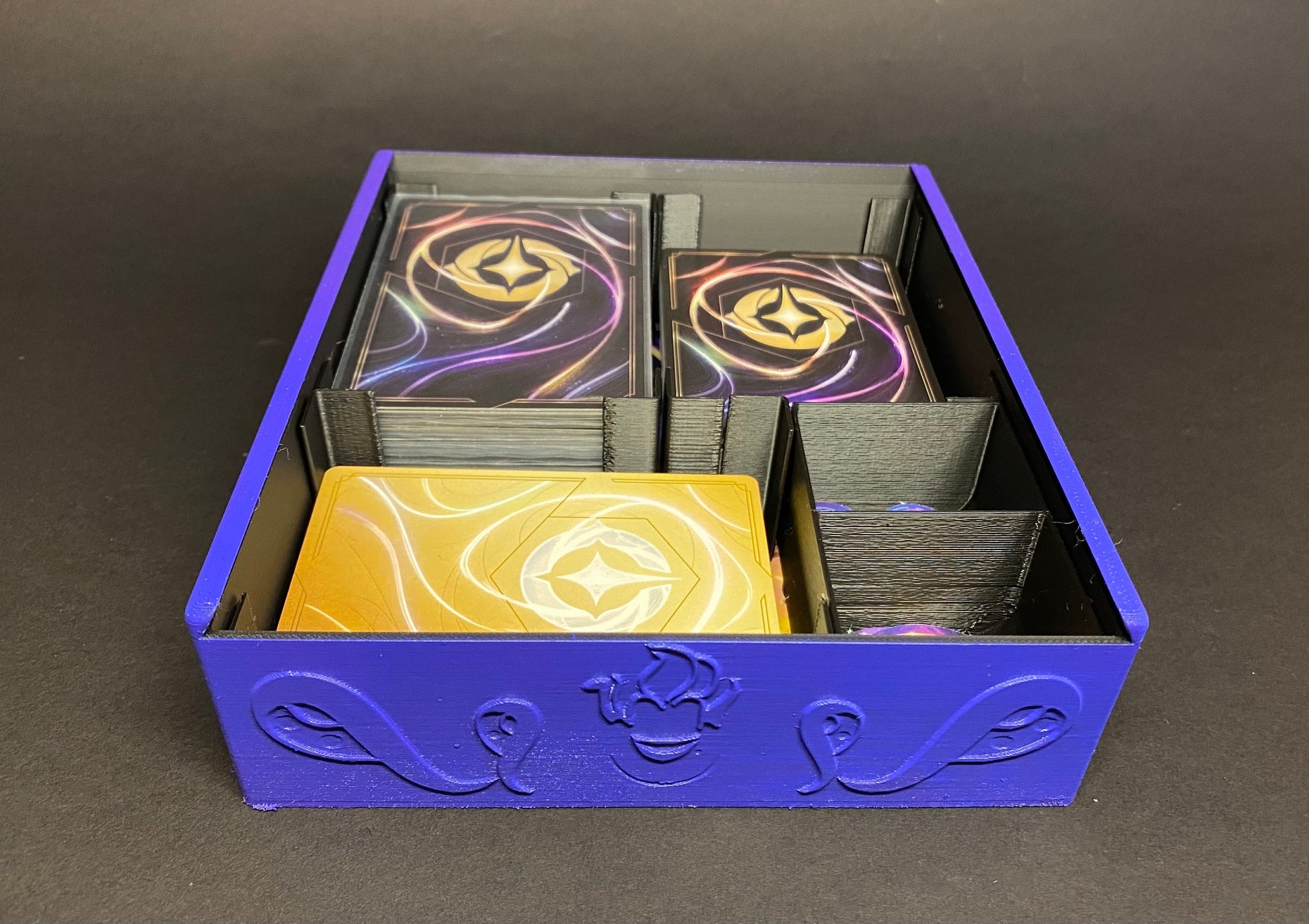 Boîte de rangement Deckbox Lorcana le retour d’Ursula - La Quête des Illumineurs menace des profondeurs